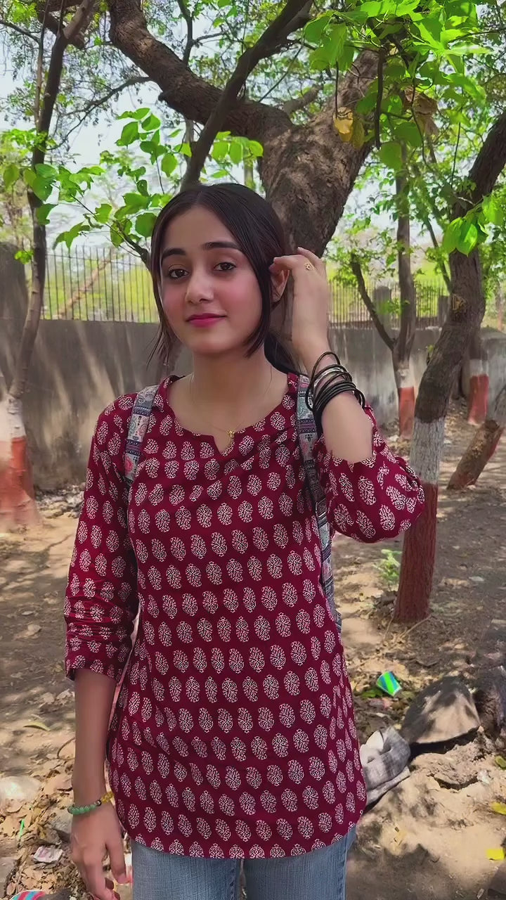 maroon cotton kurti with a white block print pattern